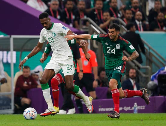 Saudi Arabia v Mexico 2022 FIFA World Cup, WM, Weltmeisterschaft, Fussball Mohamed Kanno of Saudi Arabia battles with Luis Chavez of Mexico during the 2022 FIFA World Cup Group C match at Lusail Stadium, Lusail Content Not Available For UK Newspapers Copyright: xPaulxChestertonx FIL-17655-0077 UK Newspapers OUT
