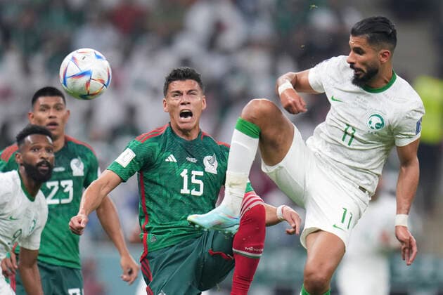 (221130) -- LUSAIL, Nov. 30, 2022 -- Hector Moreno (2nd R) of Mexico reacts as he vies with Saleh Alshehri (1st R) of Saudi Arabia during the Group C match between Saudi Arabia and Mexico at the 2022 FIFA World Cup, WM, Weltmeisterschaft, Fussball at Lusail Stadium in Lusail, Qatar, Nov. 30, 2022. ) (SP)QATAR-LUSAIL-2022 WORLD CUP-GROUP C-KSA VS MEX MengxDingbo 