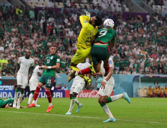 Saudi Arabia v Mexico 2022 FIFA World Cup, WM, Weltmeisterschaft, Fussball Raul JimÃ nez of Mexico and Saudi Arabia goalkeeper Mohammed Al-Owais collide as they battle for the ball during the 2022 FIFA World Cup Group C match at Lusail Stadium, Lusail Content Not Available For UK Newspapers Copyright: xPaulxChestertonx FIL-17655-0219 UK Newspapers OUT