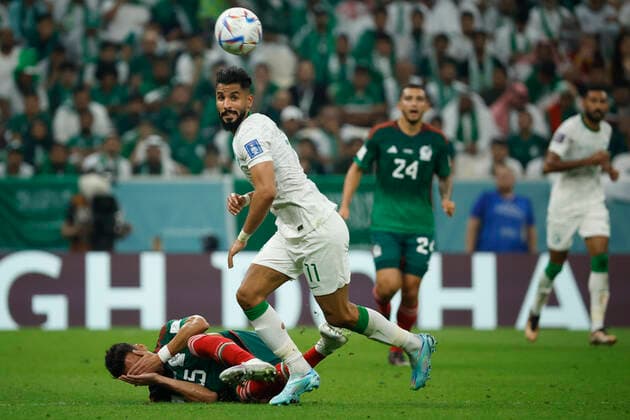 Saleh Alshehri (R) of Saudi Arabia vies for the ball with Hector Moreno of Mexico during a FIFA World Cup, WM, Weltmeisterschaft, Fussball soccer match of the group phase between Saudi Arabia and Mexico at Lusail stadium, Qatar 30 November 2022. Mundial de Fútbol: Saudi Arabia vs. Mexico !ACHTUNG: NUR REDAKTIONELLE NUTZUNG!  Copyright: xJoséxMéndezx GR3210 20221130-aface220cb82530fae20b91e86a3136b632deb65