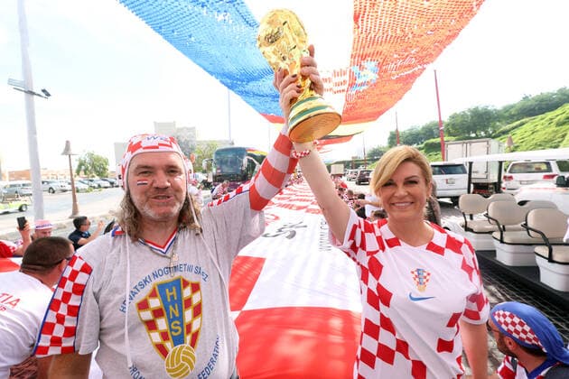 FIFA World Cup 2022, Croatia national team, Kolinda Grabar-Kitarovic celebrates with fans before the match