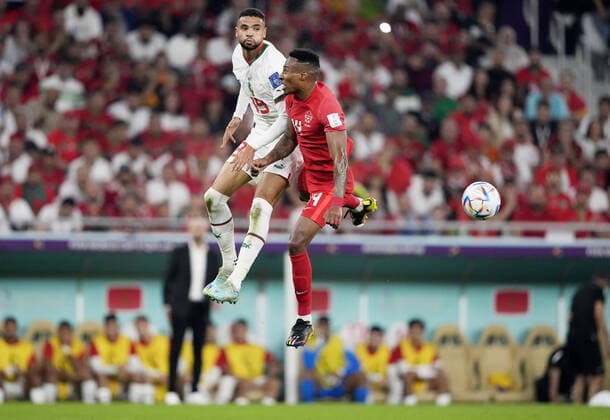 Mandatory Credit: Photo by Dave Shopland Shutterstock (13640369aw) Yousseff En-Nesyri of Morocco and Mark-Anthony Kaye of Canada. Canada v Morocco, FIFA World Cup, WM, Weltmeisterschaft, Fussball 2022, Group F, Football, Al Thumama Stadium, Doha, Qatar - 01 Dec 2022 Editorial Use Only Canada v Morocco, FIFA World Cup 2022, Group F, Football, Al Thumama Stadium, Doha, Qatar - 01 Dec 2022 Editorial Use Only Copyright: xDavexShopland Shutterstockx 13640369aw