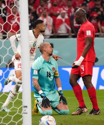 (221201) -- DOHA, Dec. 1, 2022 -- Youssef En-Nesyri (L) of Morocco celebrates after scoring during the Group F match between Canada and Morocco at the 2022 FIFA World Cup, WM, Weltmeisterschaft, Fussball at Al Thumama Stadium in Doha, Qatar, Dec. 1, 2022. ) (SP)QATAR-DOHA-2022 WORLD CUP-GROUP F-CAN VS MAR LixGang 