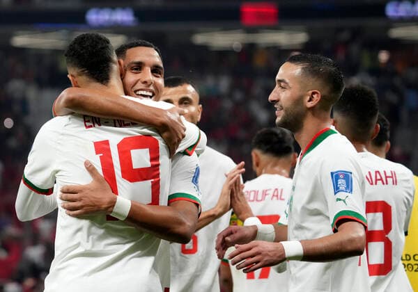 (221201) -- DOHA, Dec. 1, 2022 -- Youssef En-Nesyri (L) of Morocco celebrates after scoring during the Group F match between Canada and Morocco at the 2022 FIFA World Cup, WM, Weltmeisterschaft, Fussball at Al Thumama Stadium in Doha, Qatar, Dec. 1, 2022. ) (SP)QATAR-DOHA-2022 WORLD CUP-GROUP F-CAN VS MAR LixGang 
