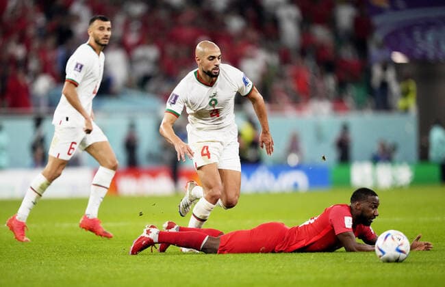 Mandatory Credit: Photo by Dave Shopland Shutterstock (13640369cs) Sofyan Amrabat of Morocco and Junior Hoilett of Canada seen on the floor. Canada v Morocco, FIFA World Cup, WM, Weltmeisterschaft, Fussball 2022, Group F, Football, Al Thumama Stadium, Doha, Qatar - 01 Dec 2022 Editorial Use Only Canada v Morocco, FIFA World Cup 2022, Group F, Football, Al Thumama Stadium, Doha, Qatar - 01 Dec 2022 Editorial Use Only Copyright: xDavexShopland Shutterstockx 13640369cs