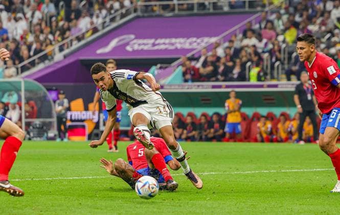 Costa Rica v Germany 2022 FIFA World Cup, WM, Weltmeisterschaft, Fussball 01 12 2022. Match 44 Jamal Musiala (14) of Germany shoots towards the goal during the 2022 Fifa World Cup match between Costa Rica and Germany at Al Bayt Stadium, Al Khor, Qatar on 1 December 2022. Editorial use only , Copyright: xNigelxKeenex PSI-16417-0015