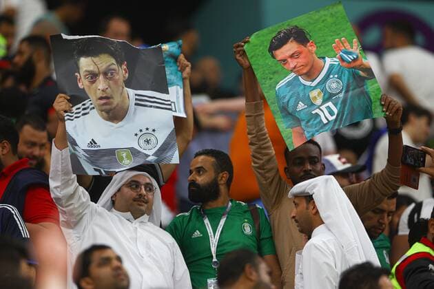 Mandatory Credit: Photo by Kieran McManus Shutterstock (13640390y) Fans hold up a picture of German football player Mesut Ozil Costa Rica v Germany, FIFA World Cup, WM, Weltmeisterschaft, Fussball 2022, Group E, Football, Al Bayt Stadium, Al Khor, Qatar - 01 Dec 2022 Editorial Use Only Costa Rica v Germany, FIFA World Cup 2022, Group E, Football, Al Bayt Stadium, Al Khor, Qatar - 01 Dec 2022 Editorial Use Only  Copyright: xKieranxMcManus Shutterstockx 13640390y