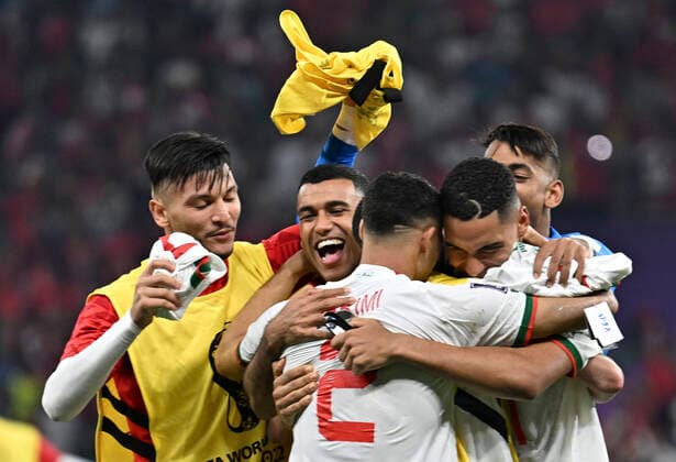 (221201) -- DOHA, Dec. 1, 2022 -- Players of Morocco celebrate advancing into the round of 16 match after the Group F match between Canada and Morocco at the 2022 FIFA World Cup, WM, Weltmeisterschaft, Fussball at Al Thumama Stadium in Doha, Qatar, Dec. 1, 2022. ) (SP)QATAR-DOHA-2022 WORLD CUP-GROUP F-CAN VS MAR XinxYuewei 
