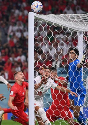 (221201) -- DOHA, Dec. 1, 2022 -- Selim Amallah (2nd L) and goalkeeper Yassine Bounou (1st R) of Morocco vie with Alistair Johnston (1st L) and Steven Vitoria of Canada during the Group F match between Canada and Morocco at the 2022 FIFA World Cup, WM, Weltmeisterschaft, Fussball at Al Thumama Stadium in Doha, Qatar, Dec. 1, 2022. ) (SP)QATAR-DOHA-2022 WORLD CUP-GROUP F-CAN VS MAR ChenxCheng 
