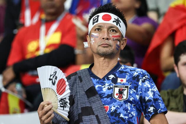 (221201) -- DOHA, Dec. 1, 2022 -- A fan of Japan waits for the start of the Group E match between Japan and Spain at the 2022 FIFA World Cup, WM, Weltmeisterschaft, Fussball at Khalifa International Stadium in Doha, Qatar, Dec. 1, 2022. ) (SP)QATAR-DOHA-2022 WORLD CUP-GROUP E-JPN VS ESP CaoxCan 