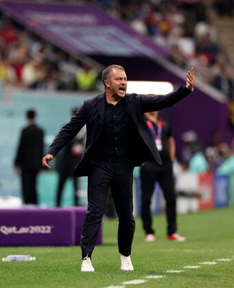 (221201) -- AL KHOR, Dec. 1, 2022 -- Hansi Flick, head coach of Germany, reacts during the Group E match between Costa Rica and Germany at the 2022 FIFA World Cup, WM, Weltmeisterschaft, Fussball at Al Bayt Stadium in Al Khor, Qatar, Dec. 1, 2022. ) (SP)QATAR-AL KHOR-2022 WORLD CUP-GROUP E-CRC VS GER XuxZijian 