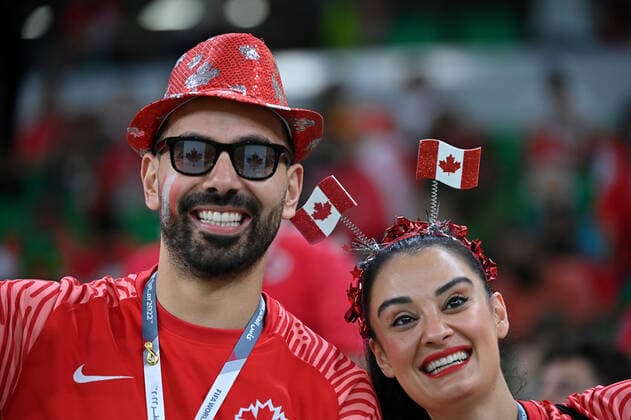 (221201) -- DOHA, Dec. 1, 2022 -- Fans of Canada pose before the Group F match between Canada and Morocco at the 2022 FIFA World Cup, WM, Weltmeisterschaft, Fussball at Al Thumama Stadium in Doha, Qatar, Dec. 1, 2022. ) (SP)QATAR-DOHA-2022 WORLD CUP-GROUP F-CAN VS MAR ChenxCheng 