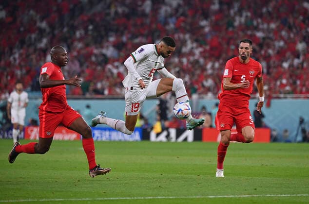 (221201) -- DOHA, Dec. 1, 2022 -- Youssef En-Nesyri (C) of Morocco shoots and scores during the Group F match between Canada and Morocco at the 2022 FIFA World Cup, WM, Weltmeisterschaft, Fussball at Al Thumama Stadium in Doha, Qatar, Dec. 1, 2022. ) (SP)QATAR-DOHA-2022 WORLD CUP-GROUP F-CAN VS MAR ChenxCheng 