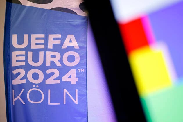 A flag with the inscription UEFA EURO 2024 Cologne at the presentation of the plans for the European Football Championship 2024 UEFA EURO 2024 in Germany A total of five matches of the European Football Championship are to be played in Cologne at the RheinEnergie Stadium, including four preliminary round matches and one round of 16 Cologne, 01 12 2022 NRW Germany Copyright: xChristophxHardtx