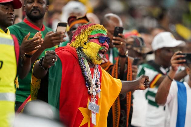 LUSAIL, QATAR - DECEMBER 2: Supporter of Cameroon pose for a photo before the FIFA World Cup, WM, Weltmeisterschaft, Fussball Qatar 2022 group G match between Brazil and Cameroon at Lusail Stadium on December 2, 2022 in Lusail, Qatar. (Photo by Florencia Tan Jun PxImages Icon Sportswire) SOCCER: DEC 02 FIFA World Cup - Brazil v Cameroon Icon221202551