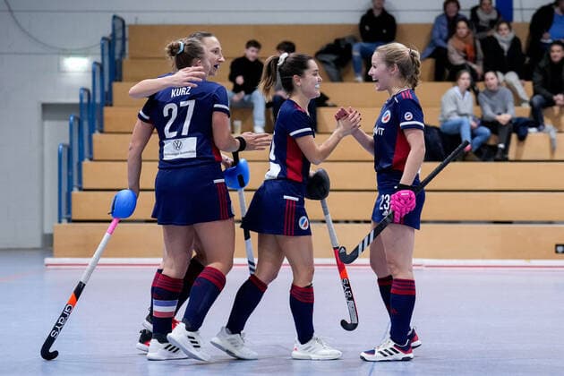 from left Stine Kurz MHC, 27 , Charlotte Gerstenhöfer MHC, 28 , Goal scorer Fiona Felber MHC, 6 , Anissa Korth MHC, 23 , Players of Mannheimer HC MHC , celebrate the goal, celebration, celebration about the goal, optimistic, game scene, highlight, action, action, 03 12 2022, Mannheim Germany , Indoor Hockey, 1 Bundesliga South, Women, Mannheimer HC Feudenheimer HC xozx
