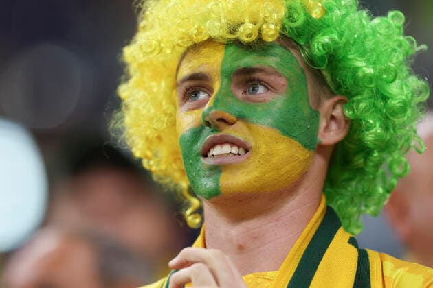 (221203) -- AL RAYYAN, Dec. 3, 2022 -- A fan of Australia looks on before the Round of 16 match between Argentina and Australia at the 2022 FIFA World Cup, WM, Weltmeisterschaft, Fussball at Ahmad Bin Ali Stadium in Al Rayyan, Qatar, Dec. 3, 2022. ) (SP)QATAR-AL RAYYAN-2022 WORLD CUP-ROUND OF 16-ARG VS AUS HanxYan 