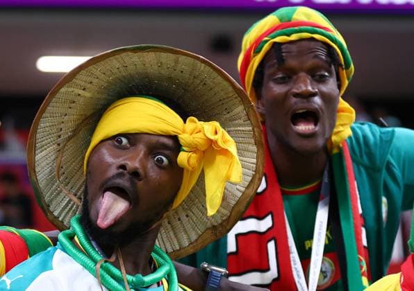 Al Khor, Qatar, 4th December 2022. Senegal fans before the FIFA World Cup, WM, Weltmeisterschaft, Fussball 2022 match at Al Bayt Stadium, Al Khor. Picture credit should read: David Klein Sportimage EDITORIAL USE ONLY. No use with unauthorised audio, video, data, fixture lists, club league logos or live services. Online in-match use limited to 120 images, no video emulation. No use in betting, games or single club league player publications. SPI-2083-0002