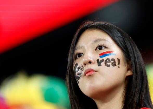 (221205) -- DOHA, Dec. 5, 2022 -- A fan of South Korea waits for the start of the Round of 16 match between Brazil and South Korea at the 2022 FIFA World Cup, WM, Weltmeisterschaft, Fussball at Ras Abu Aboud (974) Stadium in Doha, Qatar, Dec. 5, 2022. ) (SP)QATAR-DOHA-2022 WORLD CUP-ROUND OF 16-BRA VS KOR WangxLili 