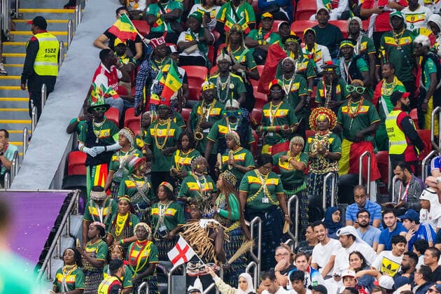 AL KHOR, - DECEMBER 04: Senegal fans during the round of 16 match of the 2022 FIFA World Cup, WM, Weltmeisterschaft, Fussball in Qatar between England and Senegal on December 4, 2022, at Al Bayt Stadium in Al Khor, Qatar. (Photo by Richard Gordon Icon Sportswire) SOCCER: DEC 04 FIFA World Cup - Senegal v England Icon2212041334