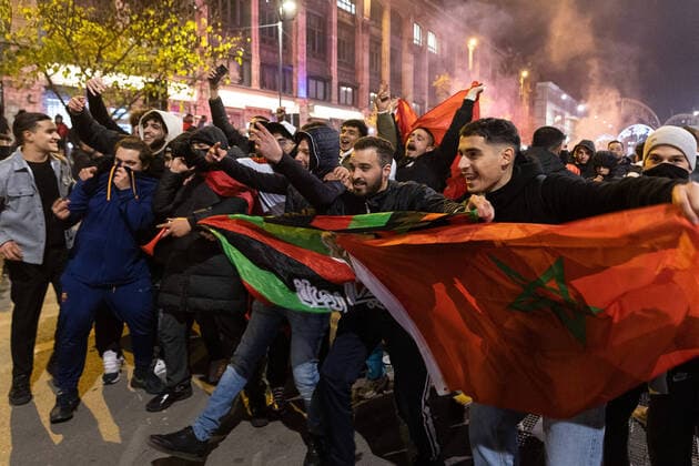 Moroccan fans celebrate in the center of Brussels, after a soccer game between the 1 8 final game between Morocco and Spain, at the FIFA 2022 World Cup, on Tuesday 06 December 2022. JAMESxARTHURxGEKIERE  x55347934x