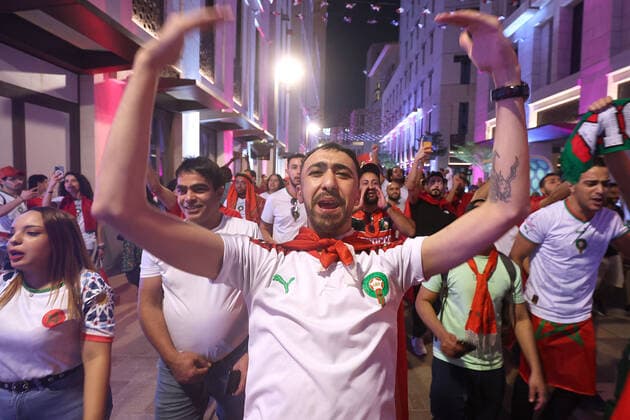Morocco supporters - FIFA World Cup, WM, Weltmeisterschaft, Fussball Qatar 2022 Morocco fans celebrate after their team s victory against Spain in the 2022 Qatar World Cup Round of 16, in Doha, Qatar, on December 6, 2022. GoranxStanzl PIXSELL