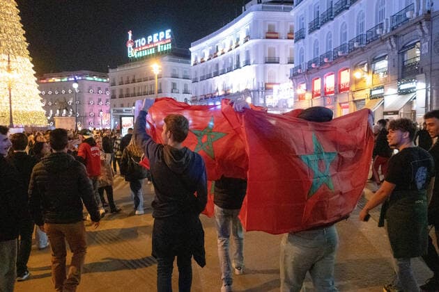 Moroccan fans celebrate in Madrid the victory at the Qatar 2022 Football World Cup December 6, 2022 - Madrid, Spain: Moroccan fans with Moroccan flags celebrate in Madrid, Spain after their national team, Nationalteam beat Spain on penalties at the Qatar 2022 Football World Cup Madrid Madrid Spain Copyright: AlvaroxLaguna