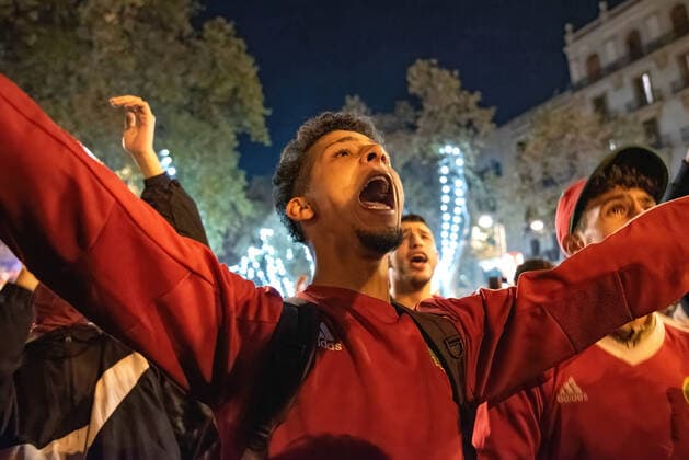December 6, 2022, Barcelona, Spain: A Moroccan cheers on Barcelona s Las Ramblas during the community s celebrations after Spain s elimination from the football World Cup on penalties. Barcelona Spain - ZUMAs197 0196182504st Copyright: xXimenaxBorrazasx