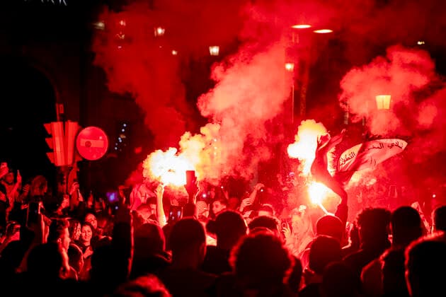 Celebration Of Morocco s Victory Against Spain In Barcelona Thousands of people take to the streets of Barcelona to celebrate the victory of the Moroccan national football team against Spain in the framework of the Qatar World Cup 2022. Fans have flown flags from Morocco and several Maghreb countries and lit flares and fireworks. In Barcelona, Catalonia, Spain on 6 December 2022. Barcelona Spain  Copyright: xAlbertxLlopx originalFilename:salame-celebrat221206_npXfh.jpg