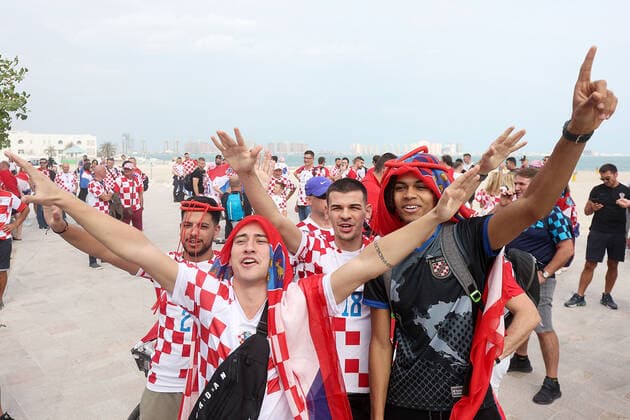 PXL_QATAR 2022 _Croatian fans Good atmosphere of Croatian fans in front of the Hilton Doha hotel for support the Croatia national team, Nationalteam before the Qatar World Cup quarter-final match in against Brazil, in Doha, Qatar, on December 9, 2022. GoranxStanzl PIXSELL