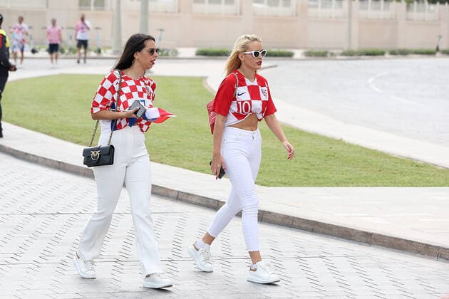 PXL_QATAR 2022 _Croatian fans Good atmosphere of Croatian fans in front of the Hilton Doha hotel for support the Croatia national team, Nationalteam before the Qatar World Cup quarter-final match in against Brazil, in Doha, Qatar, on December 9, 2022. GoranxStanzl PIXSELL