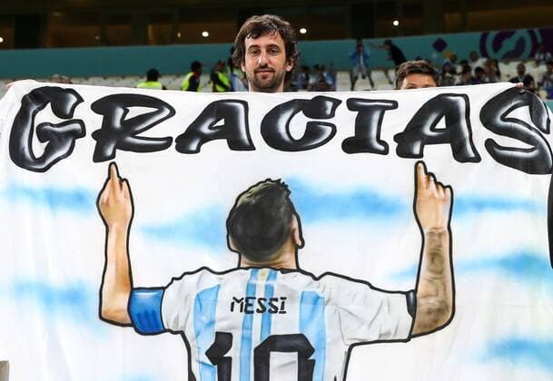 Mandatory Credit: Photo by Kieran McManus Shutterstock (13655761a) Argentina fan with a banner of Lionel Messi of Argentina Netherlands v Argentina, FIFA World Cup, WM, Weltmeisterschaft, Fussball 2022, Quarter Final, Football, Lusail Stadium, Al Daayen, Qatar - 09 Dec 2022 Editorial Use Only Netherlands v Argentina, FIFA World Cup 2022, Quarter Final, Football, Lusail Stadium, Al Daayen, Qatar - 09 Dec 2022 Editorial Use Only  Copyright: xKieranxMcManus Shutterstockx 13655761a