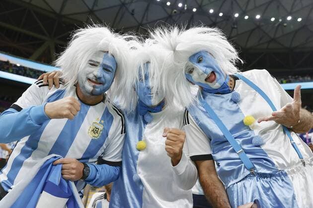 Football World Cup in Qatar Fans with their faces painted in the colors of the Argentinian flag pose for a photo before a World Cup semifinal football match between Argentina and Croatia at Lusail Stadium in Lusail, Qatar, on Dec. 13, 2022.  A14AA0001375336P 