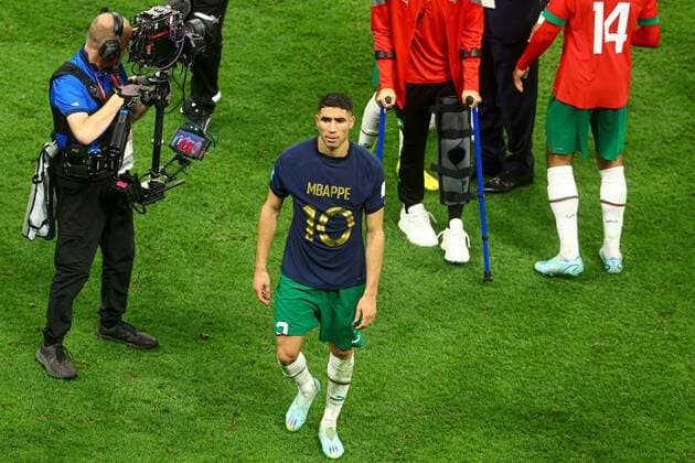 Mandatory Credit: Photo by Kieran McManus Shutterstock (13661836ct) Achraf Hakimi of Morocco with the shirt of Kylian Mbappe of France at the end of the match France v Morocco, FIFA World Cup, WM, Weltmeisterschaft, Fussball 2022, Semi Final, Football, Al Bayt Stadium, Al Khor, Qatar - 14 Dec 2022 Editorial Use Only France v Morocco, FIFA World Cup 2022, Semi Final, Football, Al Bayt Stadium, Al Khor, Qatar - 14 Dec 2022 Editorial Use Only  Copyright: xKieranxMcManus Shutterstockx 13661836ct