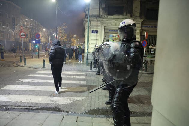 Illustration picture shows police, as small riots break out, in the streets of Brussels city center, after Morocco lost the semi-final match of Morocco vs France, at the FIFA 2022 World Cup, on Wednesday 14 December 2022. JAMESxARTHURxGEKIERE  x56188385x