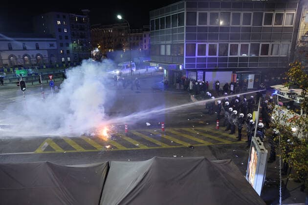 Illustration picture shows police, as small riots break out, in the streets of Brussels city center, after Morocco lost the semi-final match of Morocco vs France, at the FIFA 2022 World Cup, on Wednesday 14 December 2022. JAMESxARTHURxGEKIERE  x56188713x