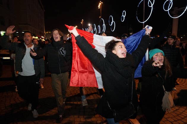 Atmosphere on the terraces of cafes and on the old port in Marseille after the victory of France in the semi-final of the football world cup against Morocco in Qatar.  GillesxBaderx xLexPictorium LePictorium_0271842