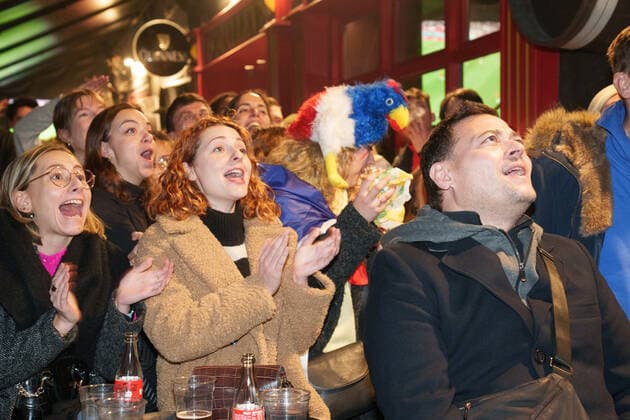 Atmosphere on the terraces of cafes and on the old port in Marseille after the victory of France in the semi-final of the football world cup against Morocco in Qatar.  GillesxBaderx xLexPictorium LePictorium_0271856
