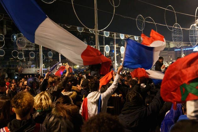 Atmosphere on the terraces of cafes and on the old port in Marseille after the victory of France in the semi-final of the football world cup against Morocco in Qatar.  GillesxBaderx xLexPictorium LePictorium_0271931