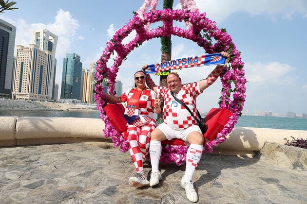 Croatia fans carry 200 meters flag Supporters of Croatia are seen prior FIFA World Cup, WM, Weltmeisterschaft, Fussball Qatar 2022 bronze medal match between Croatia and Morocco at Hilton Doha beach in Doha, Qatar on December 17, 2022. Fans carry 200 meters long flag of Croatia. GoranxStanzl PIXSELL