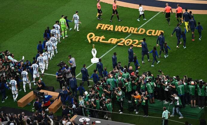 Qatar Soccer World Cup Argentina - France 8342161 18.12.2022 Argentina s and France s players enter the pitch before the Qatar 2022 World Cup final match between Argentina and France at the Lusail Iconic Stadium, in Lusail, Qatar. Grigory Sysoev Sputnik Lusail Qatar  Copyright: xGrigoryxSysoevx
