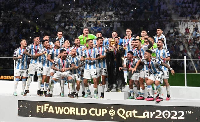 Football, men, 2022 23 season, World Cup in Qatar, final, Argentina France at Lusail Iconic Stadium in Lusail, Argentina cheers at award ceremony, Lionel Messi Argentina with World Cup trophy, 18 12 2022, Copyright: xMatthiasxKochx