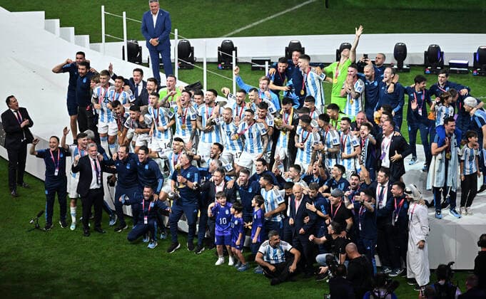 (221218) -- LUSAIER, Dec. 18, 2022 -- Members of team Argentina celebrate during the awarding ceremony of the 2022 FIFA World Cup, WM, Weltmeisterschaft, Fussball at Lusail Stadium in Lusail, Qatar, Dec. 18, 2022. ) (SP)QATAR-LUSAIL-2022 WORLD CUP-FINAL-ARG VS FRA XiaoxYijiu 