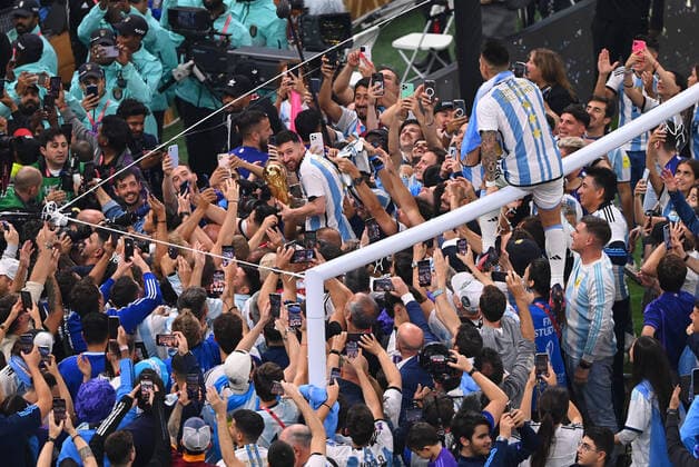FOOTBALL World Cup 2022 Final Argentina France 18 12 2022 Argentina celebrates itself as world champion Lionel Messi cheers with the World Cup trophy in the crowd