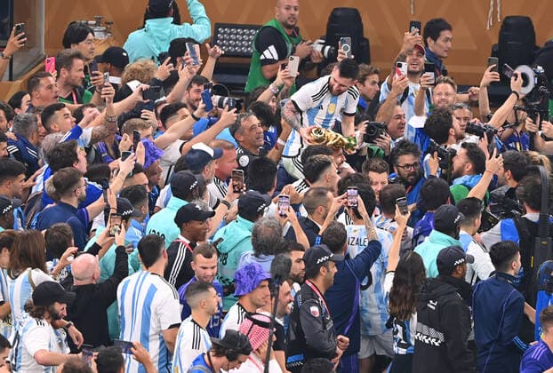 FOOTBALL World Cup 2022 Final Argentina France 18 12 2022 Argentina celebrates itself as world champion Lionel Messi cheers with the World Cup trophy in the crowd