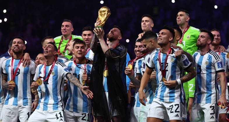 Doha, Qatar, 18th December 2022. Lionel Messi of Argentina lifts the World Cup during the FIFA World Cup, WM, Weltmeisterschaft, Fussball 2022 match at Lusail Stadium, Doha. Picture credit should read: David Klein Sportimage EDITORIAL USE ONLY. No use with unauthorised audio, video, data, fixture lists, club league logos or live services. Online in-match use limited to 120 images, no video emulation. No use in betting, games or single club league player publications. SPI-2101-0198