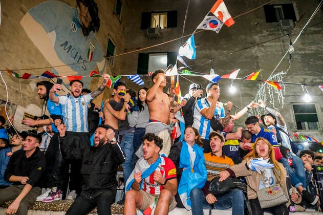 the argentinean celebration victory wolrd cup in naples Argentina world champion in Naples the Argentinean community together with Neapolitans celebrate the victory of the selection under the historic mural of Diego Armando Maradona in the Spanish quarters ABPH6930 Copyright: xAntonioxBalascox