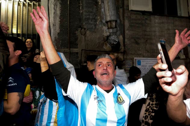 the argentinean celebration victory wolrd cup in naples Argentina world champion in Naples the Argentinean community together with Neapolitans celebrate the victory of the selection under the historic mural of Diego Armando Maradona in the Spanish quarters ABPH7050 Copyright: xAntonioxBalascox