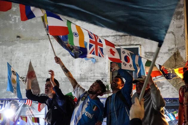 December 18, 2022, NAPOLI: Neapolitan supporters of Argentina celebrate the victory of the Argentina national soccer team at the Qatar World Cup under the Maradona mural in the Spanish Quarters, in Naples, Italy, 18 December 2022. .ANSA CESARE ABBATE NAPOLI - ZUMAa110 20221218_zaf_a110_030 Copyright: xCesarexAbbatex