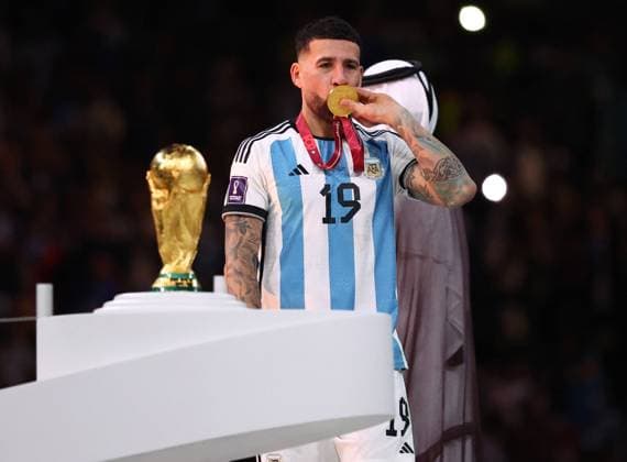 Doha, Qatar, 18th December 2022. Nicolas Otamendi of Argentina kisses his winners medal during the FIFA World Cup, WM, Weltmeisterschaft, Fussball 2022 match at Lusail Stadium, Doha. Picture credit should read: David Klein Sportimage EDITORIAL USE ONLY. No use with unauthorised audio, video, data, fixture lists, club league logos or live services. Online in-match use limited to 120 images, no video emulation. No use in betting, games or single club league player publications. SPI-2101-0239